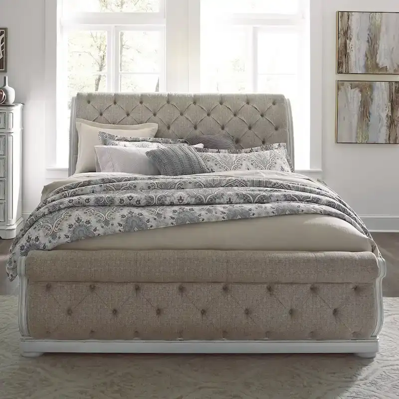 Antique White King Sleigh Bed with Upholstered Design from Magnolia Manor