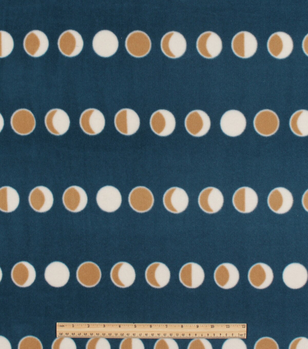 Gold Circles on Blue Anti Pill Fleece Fabric