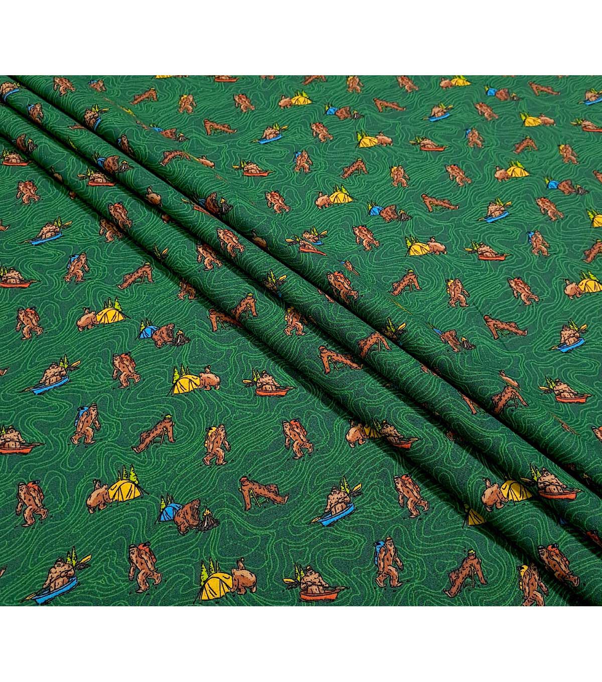 Adventures of Big Foot on Green Novelty Cotton Fabric