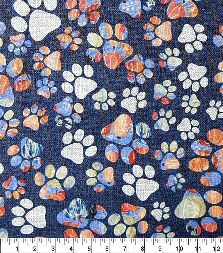 Multi Paw Prints On Navy Novelty Print Fabric